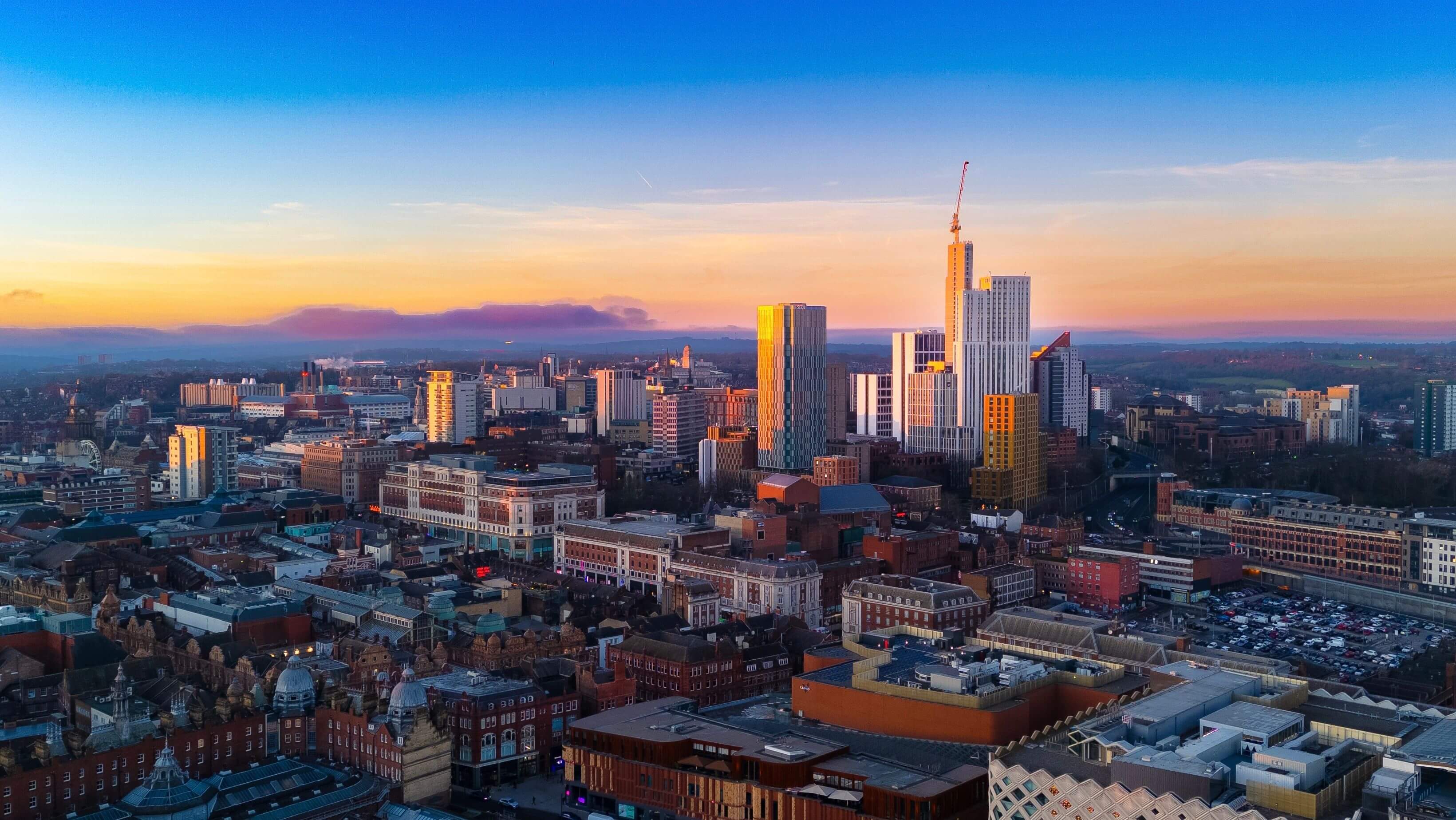 Leeds city skyline at sunset, where Kortek provides compliant ITAD services for local businesses